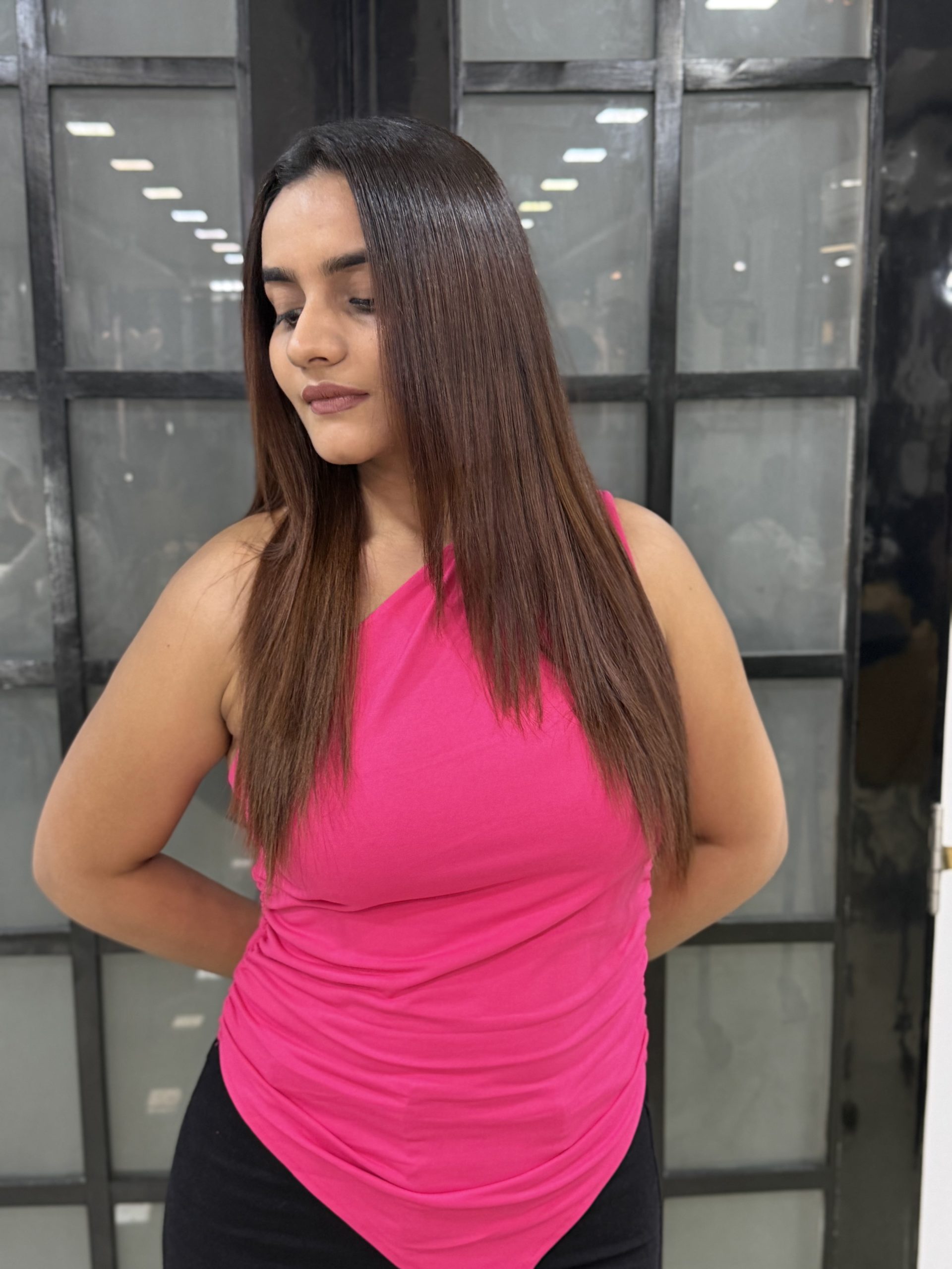 Sleek smooth hair finish at Tresses By Nitin